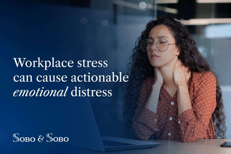 Workplace stress leading to emotional distress, woman holding her neck at a desk with Sobo & Sobo branding