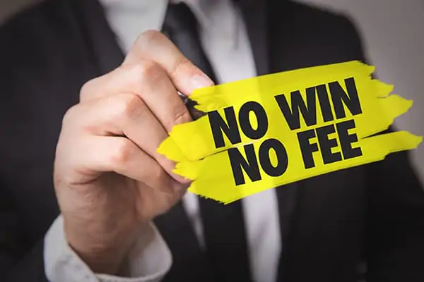 Attorney holding a yellow sign that says No Win No Fee